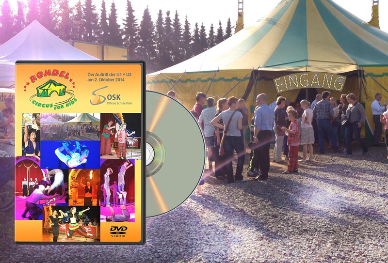 Standbild aus Film: Zirkuszelt außen mit DVD Cover "Rondel Circus for Kinds - Der Auftritt der U1 + U2 am 2. Oktober 2014 - Offene Schule Köln"